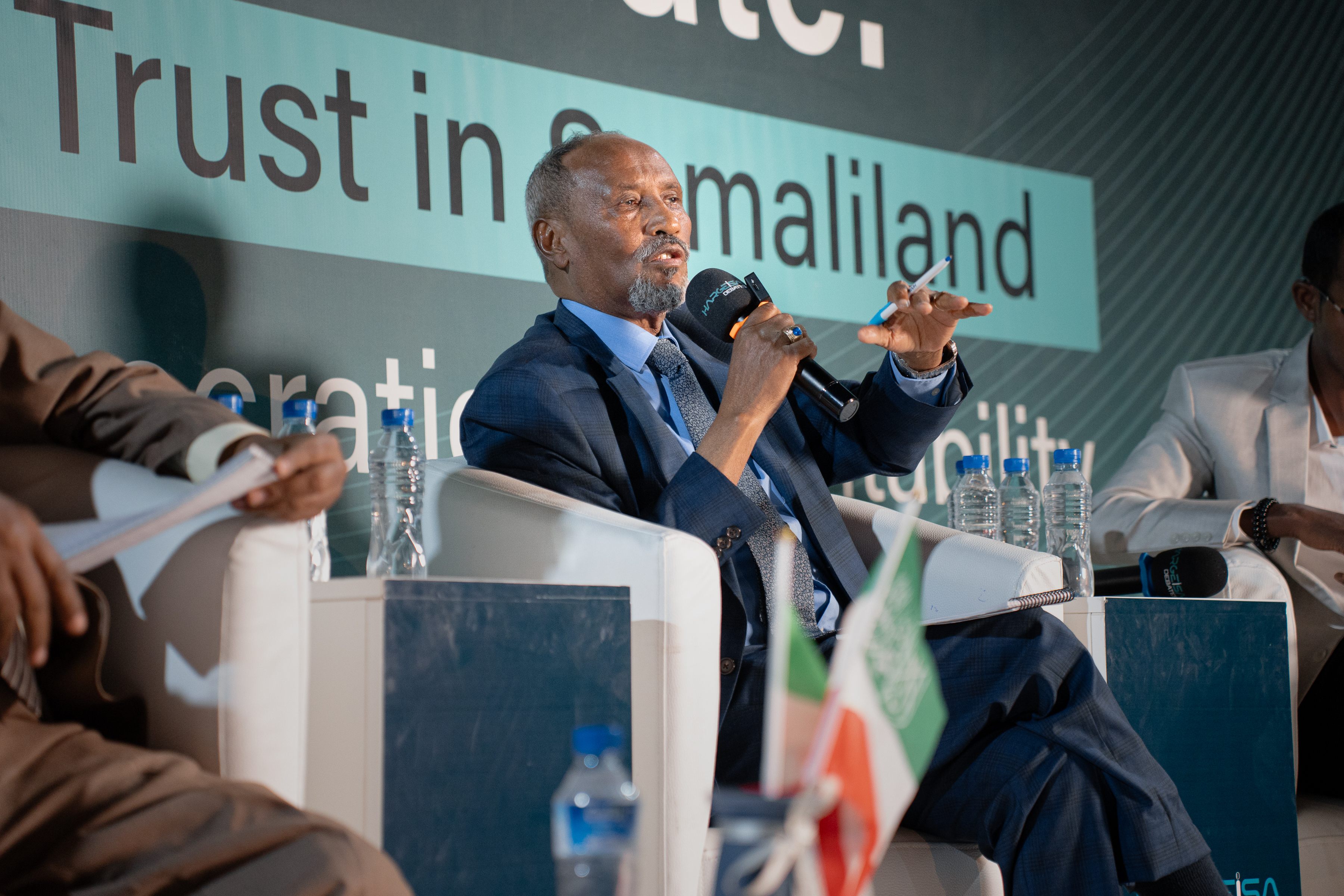 A panelist speaking about public trust in Somaliland