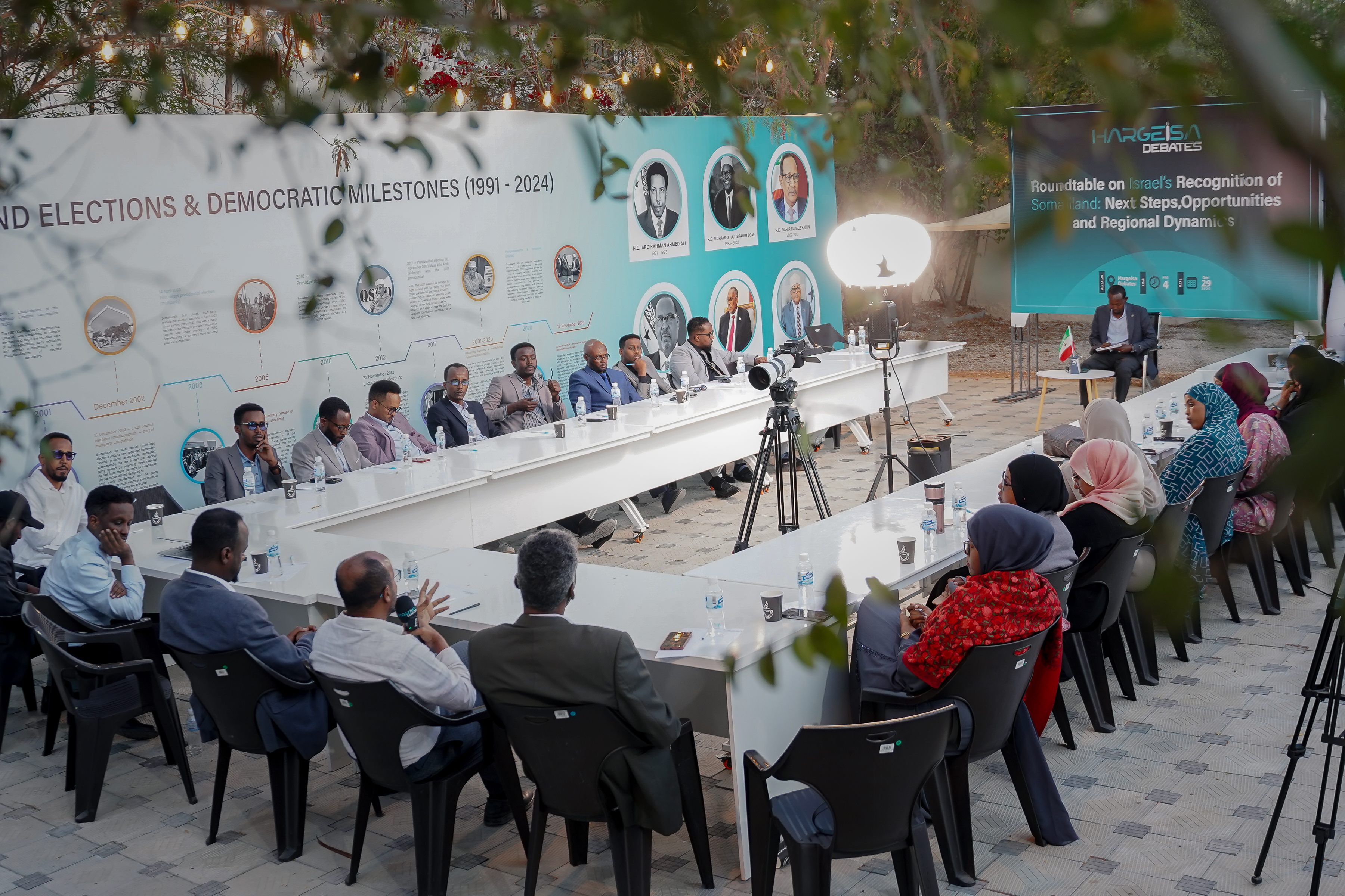 Participants gathered around a policy roundtable