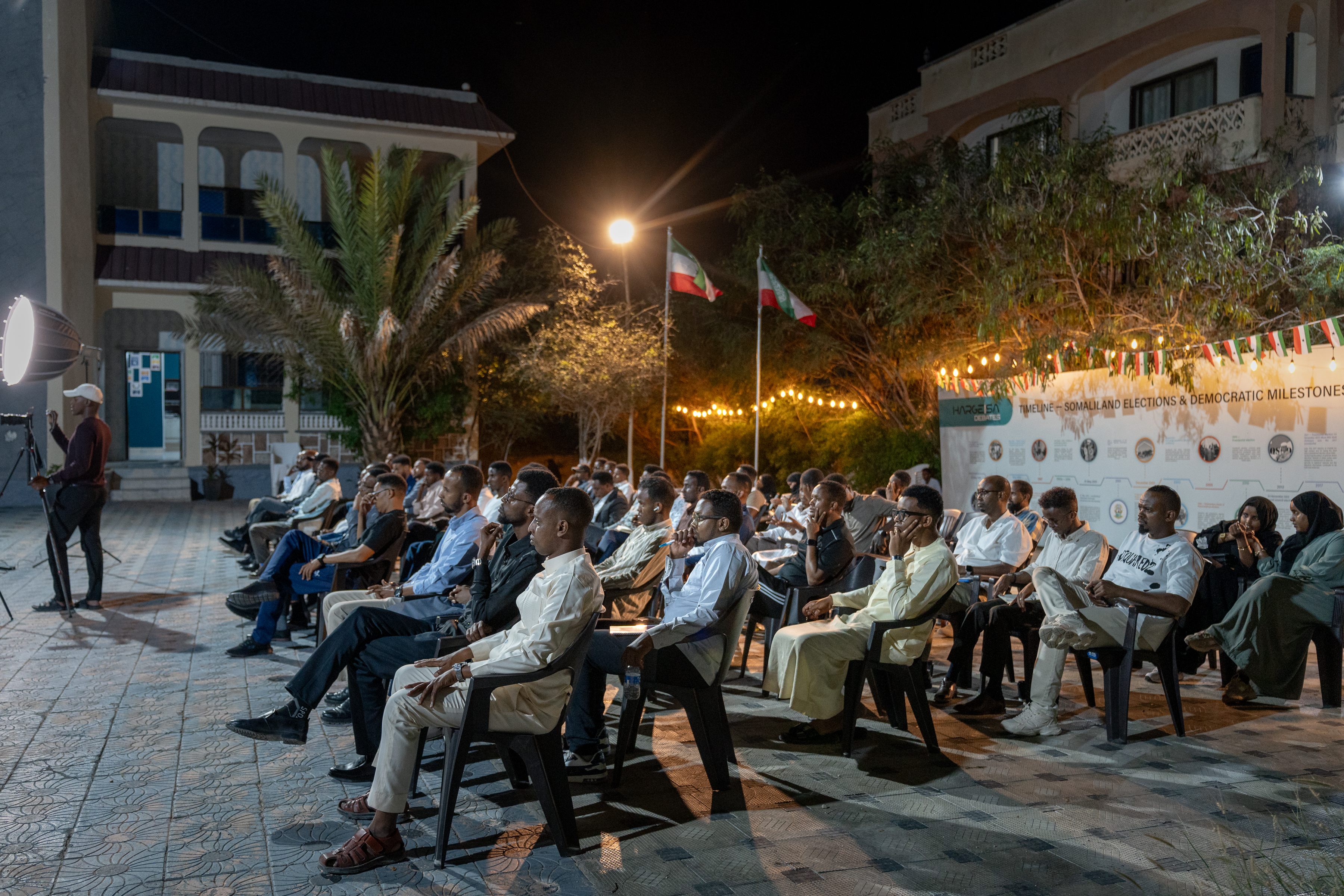 Wide audience view beneath the Somaliland flags